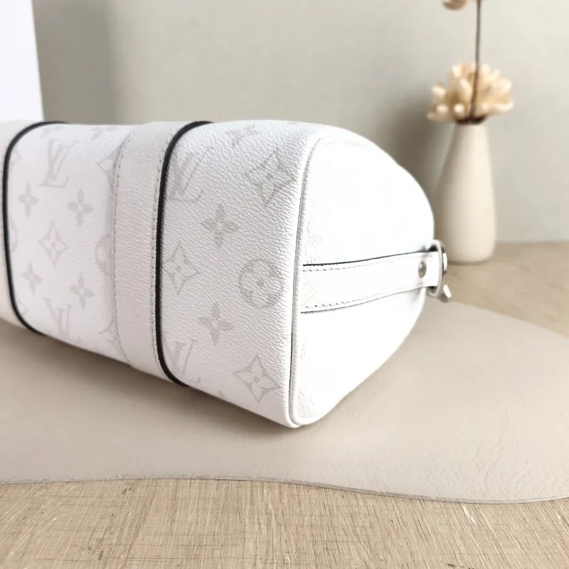 Louis Vuitton Crossbody Bag City Keepall White PVC Medium 27 × 13 × 17 cm — detail view 9 of 11