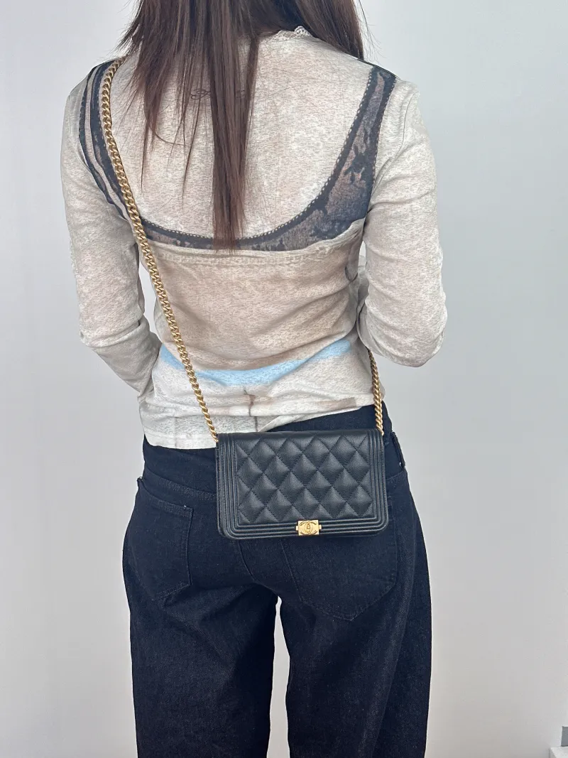Chanel Crossbody Bag Le Boy​ WOC Black Grained Calfskinmini19.2 × 3.5 × 12.3 cm — on-model view 2 of 2