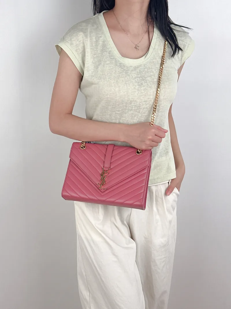 SAINT LAURENT Crossbody Bag ENVELOPE Pink Calfskin Medium24 × 6 × 17.5 cm — on-model view 3 of 3