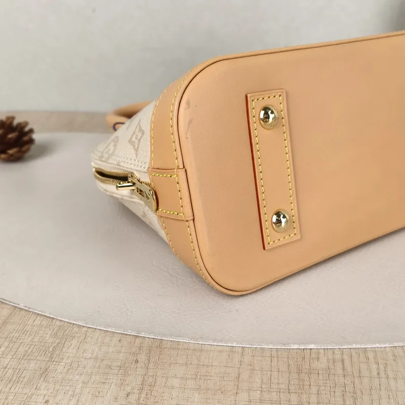 Louis Vuitton Top Handle Bag Alma BB PVCBB23.5 × 11.5 × 17.5 cm — detail view 3 of 12