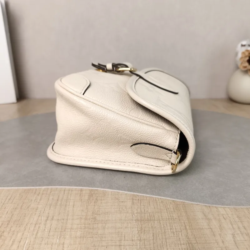 Louis Vuitton Crossbody Bag Diane Baguette Bag White Monogram Empreinte Embossed Calfskin Small 24 × 9 × 15 cm — detail view 8 of 11