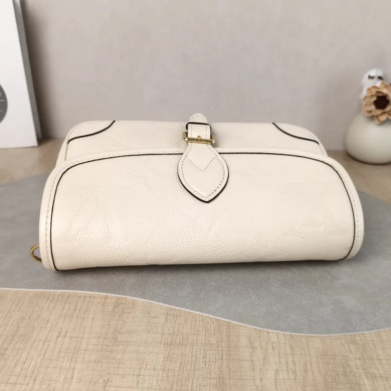 Louis Vuitton Crossbody Bag Diane Baguette Bag White Monogram Empreinte Embossed Calfskin Small 24 × 9 × 15 cm — detail view 1 of 11