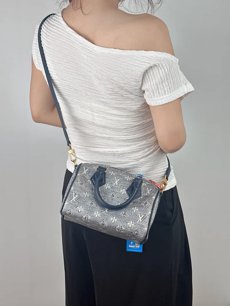 Louis Vuitton Crossbody Bag Speedy20 Blue Canvas One Size 20.5 × 12 × 13.5 cm — on-model view 2 of 2