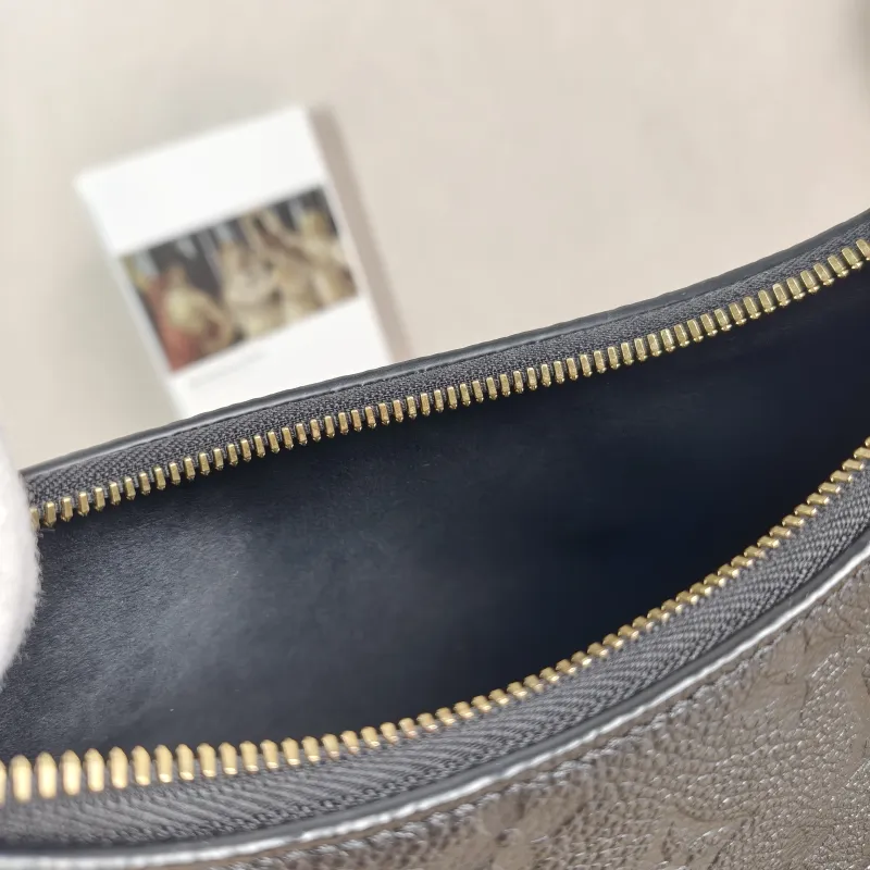 Louis Vuitton Crossbody Bag Boulogne Black Empreinte Embossed Calfskin Small 26 × 9.5 × 16 cm — detail view 12 of 12