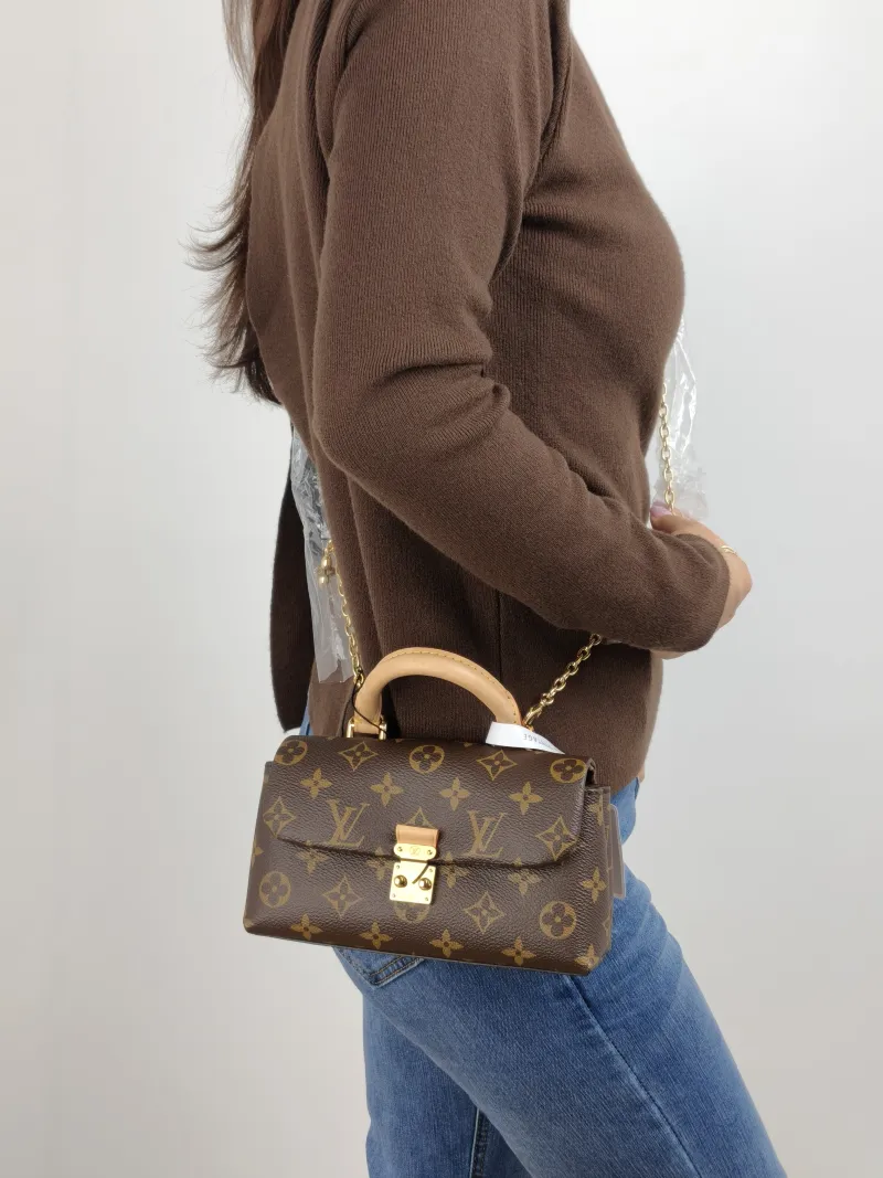 Louis Vuitton Crossbody Bag MADELEINE Monogram PVC nano 21 × 6 × 12.5 cm — on-model view 2 of 2
