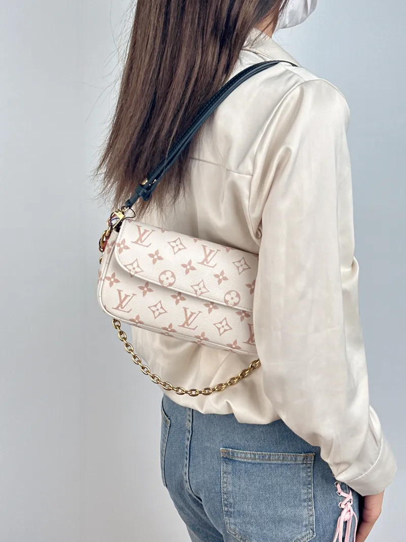 Louis Vuitton Crossbody Bag IVY · Beige PVC Small 23.5 × 4.3 × 12 cm Conditioned — on-model view 3 of 3