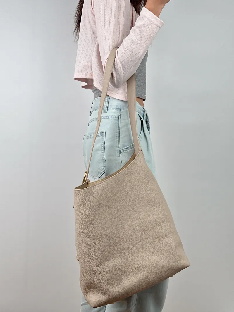 Louis Vuitton Shoulder Bag Low Key Hobo Shoulder Bag White Calfskin Medium 31 × 18 × 35 cm — on-model view 1 of 2