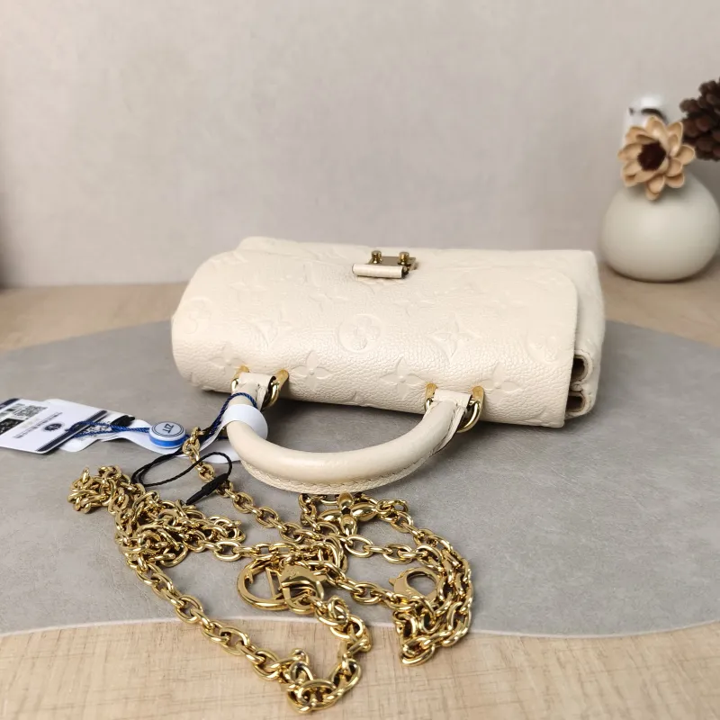 Louis Vuitton Crossbody Bag MADELEINE White Empreinte Embossed Calfskin nano 21 × 6 × 12.5 cm — detail view 4 of 11