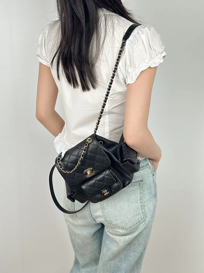 Chanel Backpackduma Black Calfskin Small18 × 9.5 × 19 cm — on-model view 1 of 3