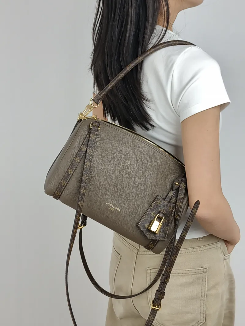 Louis Vuitton Shoulder Bag EXPRESS Shoulder Bag Grey Calfskin Small 26 × 13.5 × 17 cm — on-model view 2 of 3