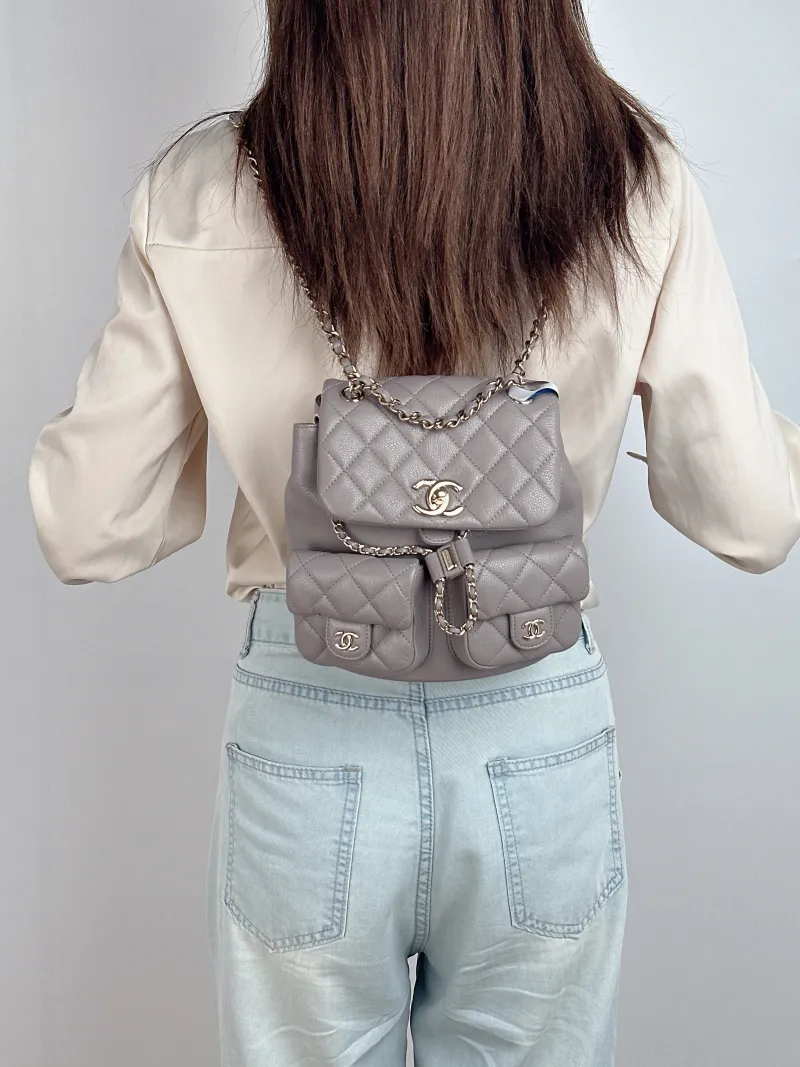 Chanel Backpack Duma Grey Grained Calfskin Medium 20.5 × 11.5 × 20 cm — on-model view 2 of 2