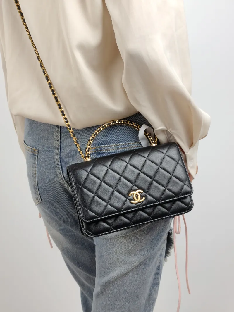Chanel Crossbody Bag woc Black Lambskin Mini 19.2 × 3.5 × 12.3 cm — on-model view 2 of 3