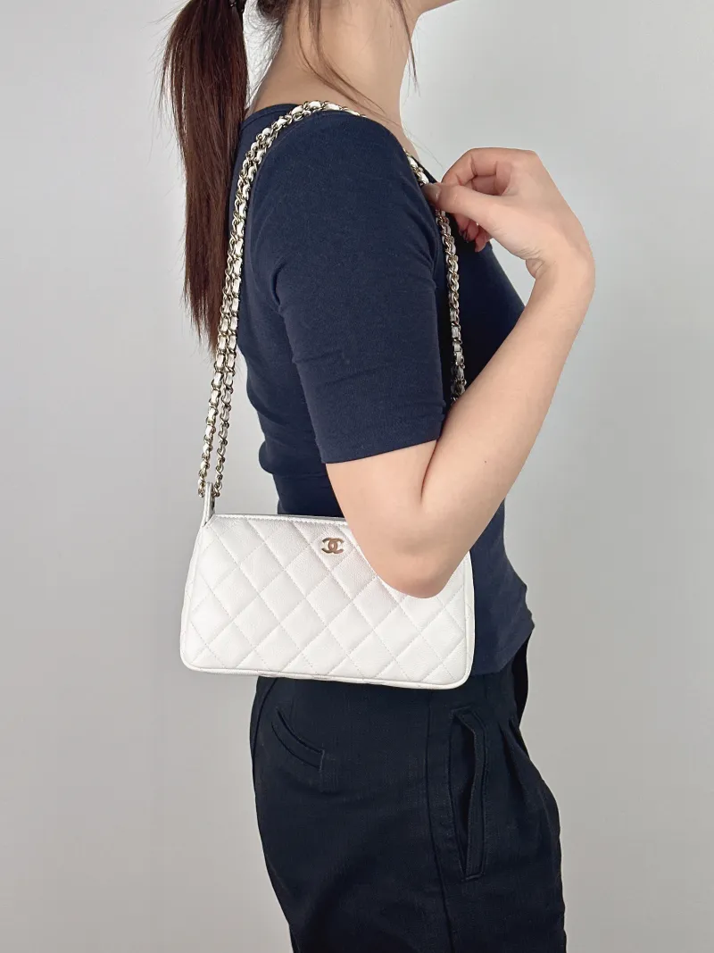 Chanel Crossbody Bag White Gold Grained Calfskin One Size 21 × 5 × 12 cm — on-model view 2 of 2