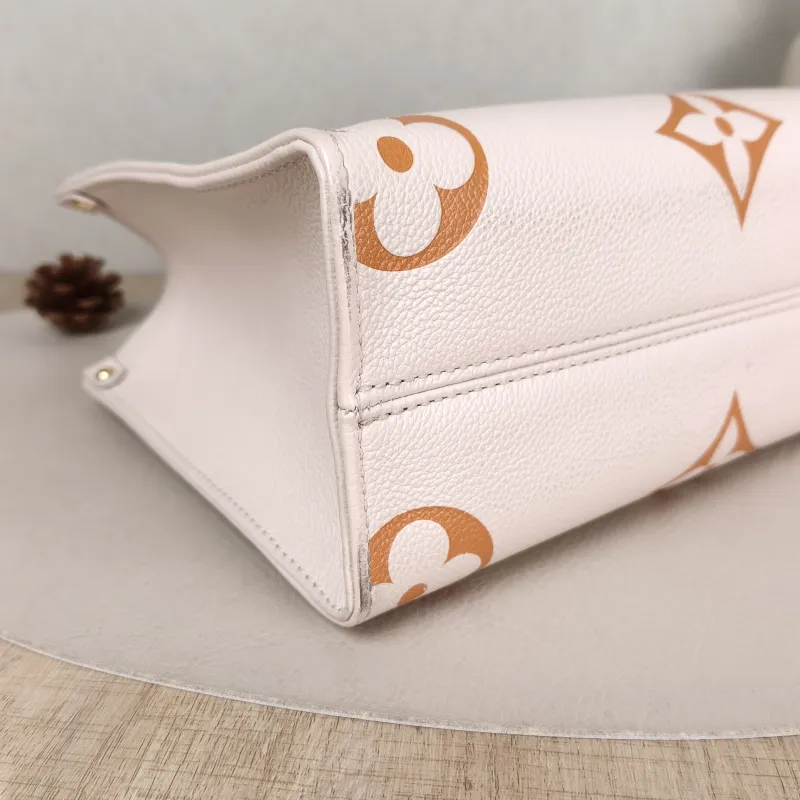 Louis Vuitton Shoulder Bag Onthego Beige Empreinte Embossed Calfskin Small 25 × 11.5 × 19 cm — detail view 2 of 9
