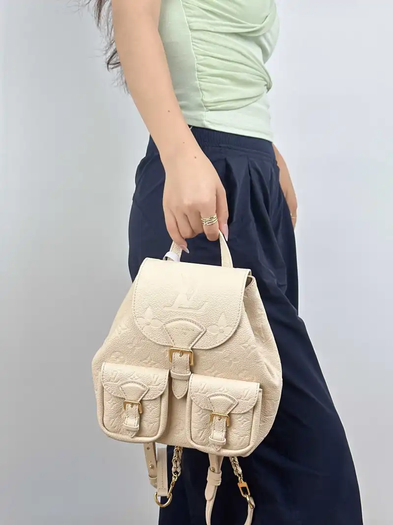 Louis Vuitton Backpack Backup Backpack White Calfskin One Size 20 × 14 × 22 cm — on-model view 2 of 3