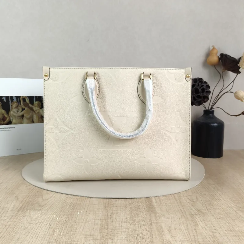 Louis Vuitton Shoulder Bag Onthego Medium White Empreinte Embossed Calfskin Medium 35 × 14 × 27 cm — cover view 2 of 5