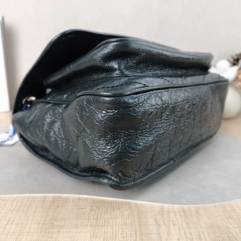 SAINT LAURENT Crossbody Bag Niki Green Waxed Leather Medium 28 × 8.5 × 20 cm — detail view 15 of 15
