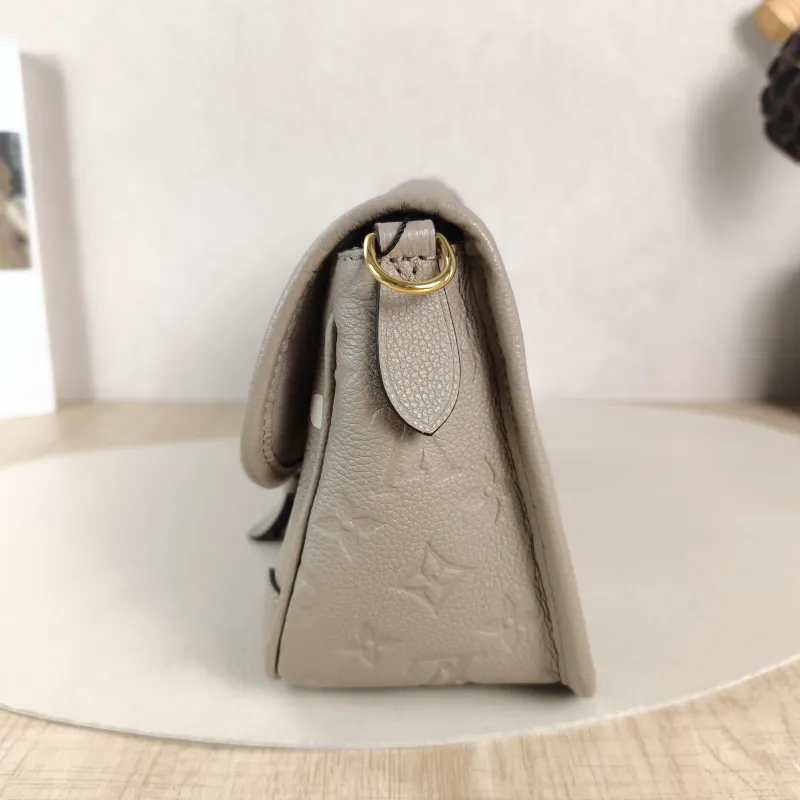 Louis Vuitton Crossbody Bag Diane Baguette Bag Monogram Empreinte Embossed Calfskin Small 24 × 9 × 15 cm — detail view 2 of 13