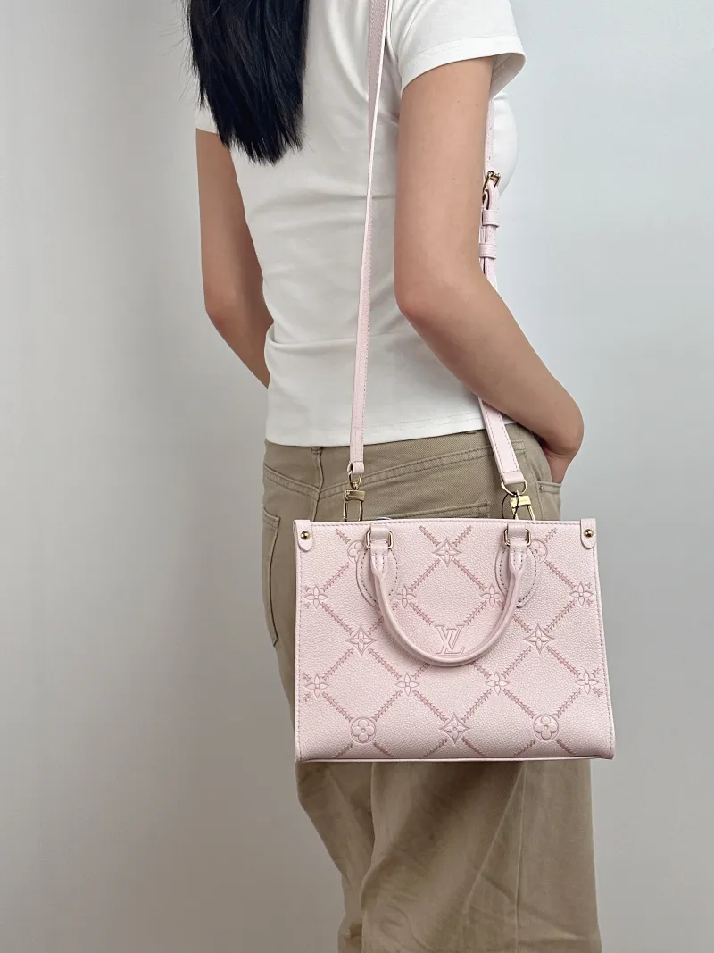 Louis Vuitton Shoulder Bag Onthego Pink Calfskin Small 25 × 11.5 × 19 cm — on-model view 2 of 3