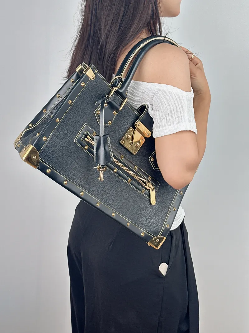 Louis Vuitton Top Handle Bag Suhali Vintage Black Calfskin One Size 36 × 12 × 22 cm — on-model view 2 of 2