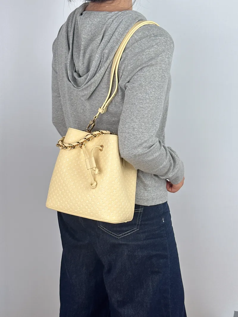 Louis Vuitton Shoulder Bag NÉONOÉ Bucket Bag BB Yellow Calfskin BB 20 × 13 × 20 cm — on-model view 2 of 3
