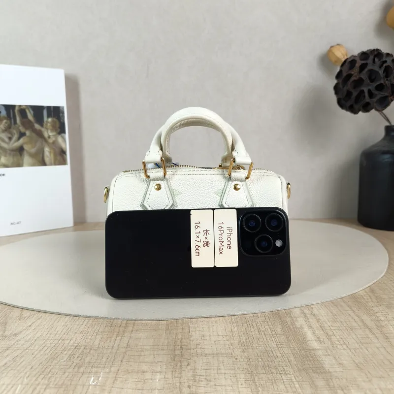 Louis Vuitton Crossbody Bag Speedy Nano White · Green Empreinte Embossed Calfskinnano16 × 7.5 × 10 cm — cover view 3 of 6
