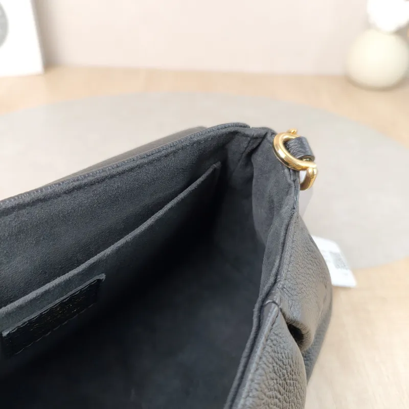 Louis Vuitton Crossbody Bag Favorite Black Monogram Empreinte Embossed Calfskin Medium 24 × 9 × 14 cm — detail view 1 of 12