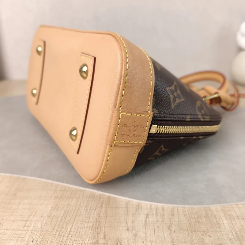 Louis Vuitton Crossbody Bag Alma BB Monogram PVC BB 23.5 × 11.5 × 17.5 cm — detail view 5 of 12