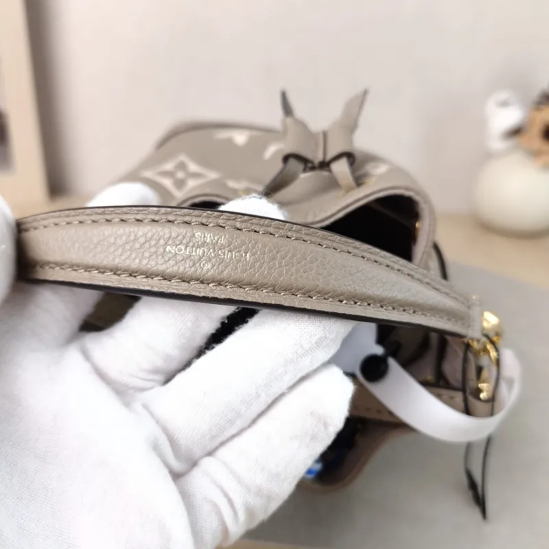 Louis Vuitton Crossbody Bag NANO NOÉ Bucket Bag Nano · White Monogram Empreinte Embossed Calfskin nano 13 × 10 × 16 cm — detail view 6 of 10