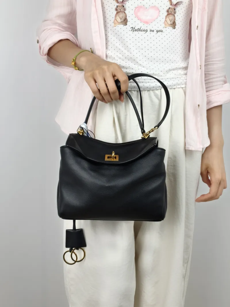 BALENCIAGA Crossbody Bag RODEO Black CC alfskinmini23 × 10 × 17 cm — on-model view 1 of 3
