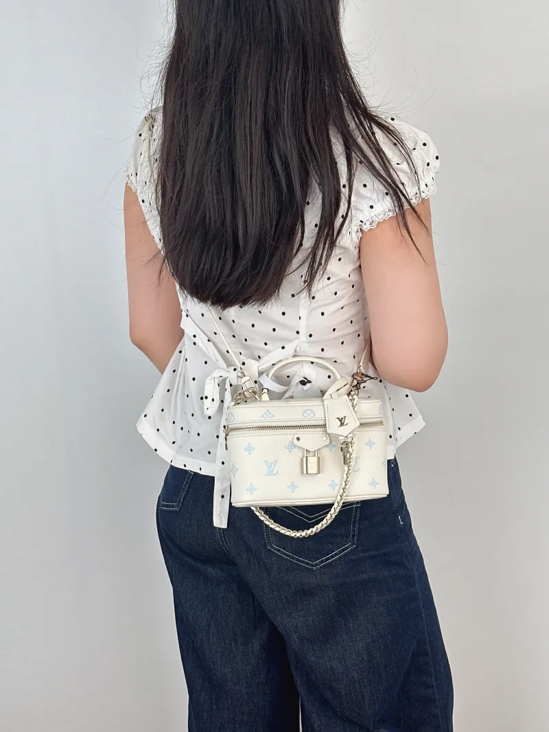 Louis Vuitton Shoulder Bag VANITY POUCH Cosmetic Bag White · Blue Calfskin One Size19 × 6.5 × 11.5 cm — on-model view 3 of 3