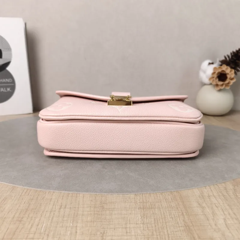 Louis Vuitton Crossbody Bag Pochette Métis East West Monogram Empreinte Embossed Calfskin Small 21.5 × 6 × 13.5 cm — cover view 2 of 5