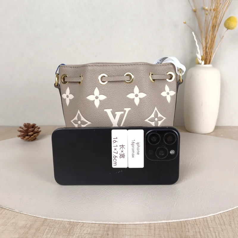 Louis Vuitton Crossbody Bag NANO NOÉ Bucket Bag Nano · White Monogram Empreinte Embossed Calfskin nano 13 × 10 × 16 cm — cover view 2 of 5