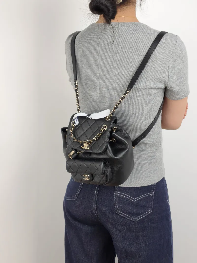 Chanel Backpack Duma Black Calfskin Small 18 × 12 × 18.5 cm — on-model view 1 of 2