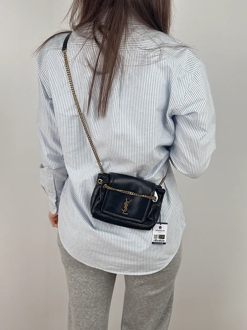 SAINT LAURENT Crossbody Bag NOLITA Black SL ambskinmini18 × 6 × 13 cm — on-model view 1 of 2