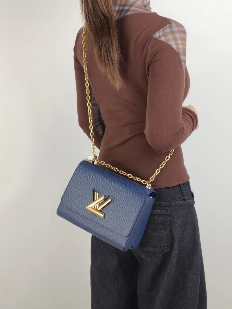 Louis Vuitton Crossbody Bag Twist Navy Epi Embossed Calfskin Medium 23 × 9.5 × 17 cm — on-model view 2 of 2