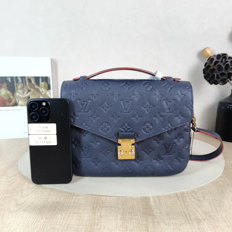 Louis Vuitton Crossbody Bag Pochette Métis · Monogram Empreinte Embossed Calfskin Medium 25 × 7 × 19 cm — cover view 5 of 5