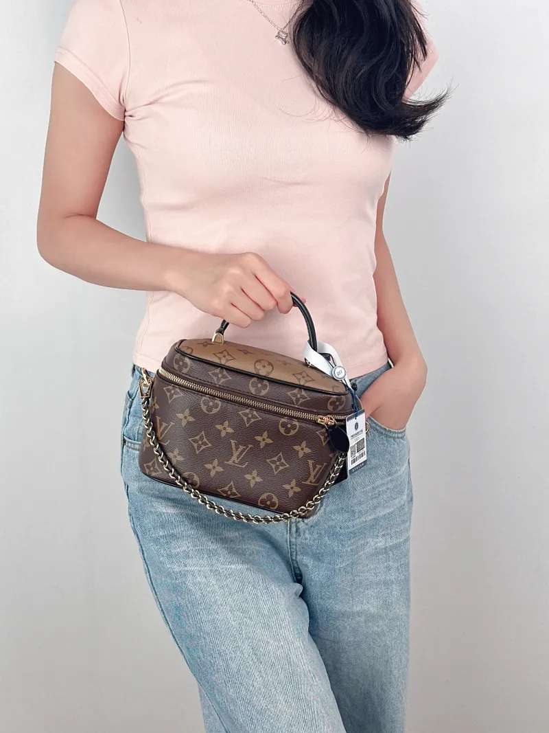 Louis Vuitton Shoulder Bag VANITY Cosmetic Bag Monogram PVC Small19 × 11 × 13 cm — on-model view 2 of 3