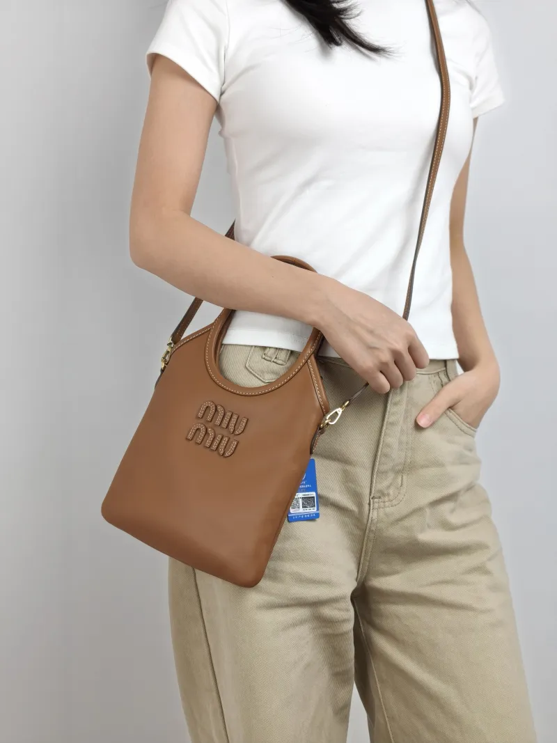 Miumiu Shoulder Bag IVY Tote Shopping Tote CC alfskin Mini 20*24 — on-model view 3 of 3