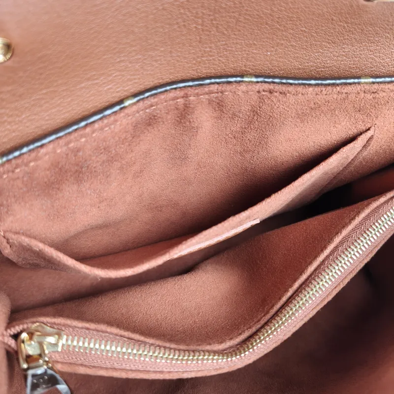 Louis Vuitton Crossbody Bag MADELEINE PVC · Calfskin BB 24.5 × 8 × 16 cm — detail view 1 of 11