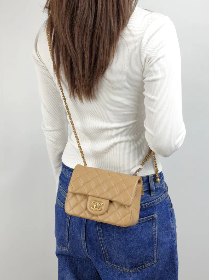 Chanel Crossbody Bag Taupe Lambskin Mini 17 × 8 × 13.5 cm — on-model view 2 of 2