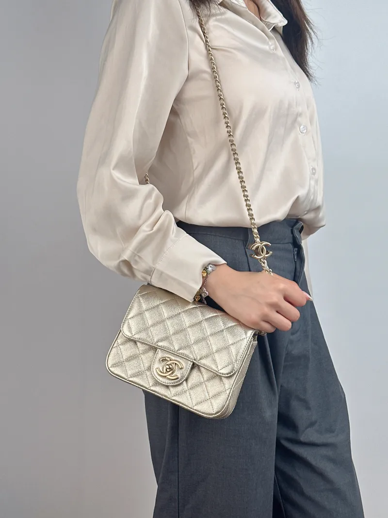 Chanel Crossbody Bag c Grained Calfskin Mini 17 × 8 × 13.5 cm — on-model view 1 of 2