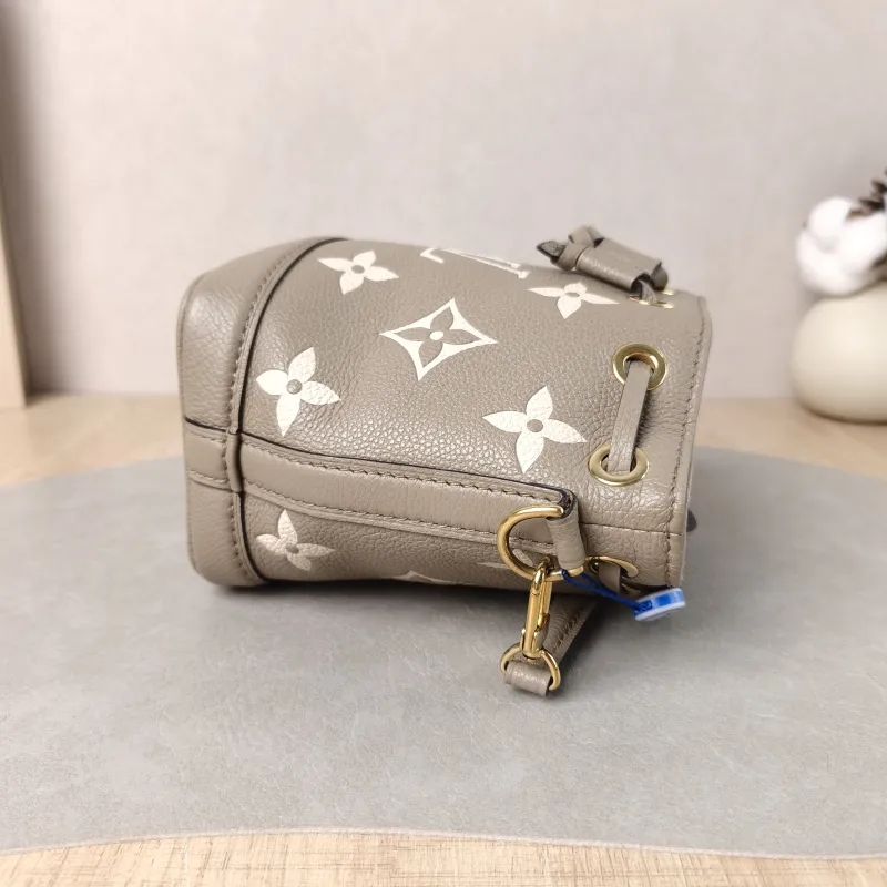 Louis Vuitton Crossbody Bag NANO NOÉ Bucket Bag Nano · White Monogram Empreinte Embossed Calfskin nano 13 × 10 × 16 cm — detail view 8 of 11