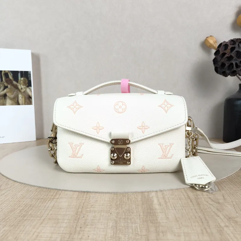 Louis Vuitton Crossbody Bag Pochette Métis East West White · Pink Monogram Empreinte Embossed Calfskin Small21.5 × 6 × 13.5 cm