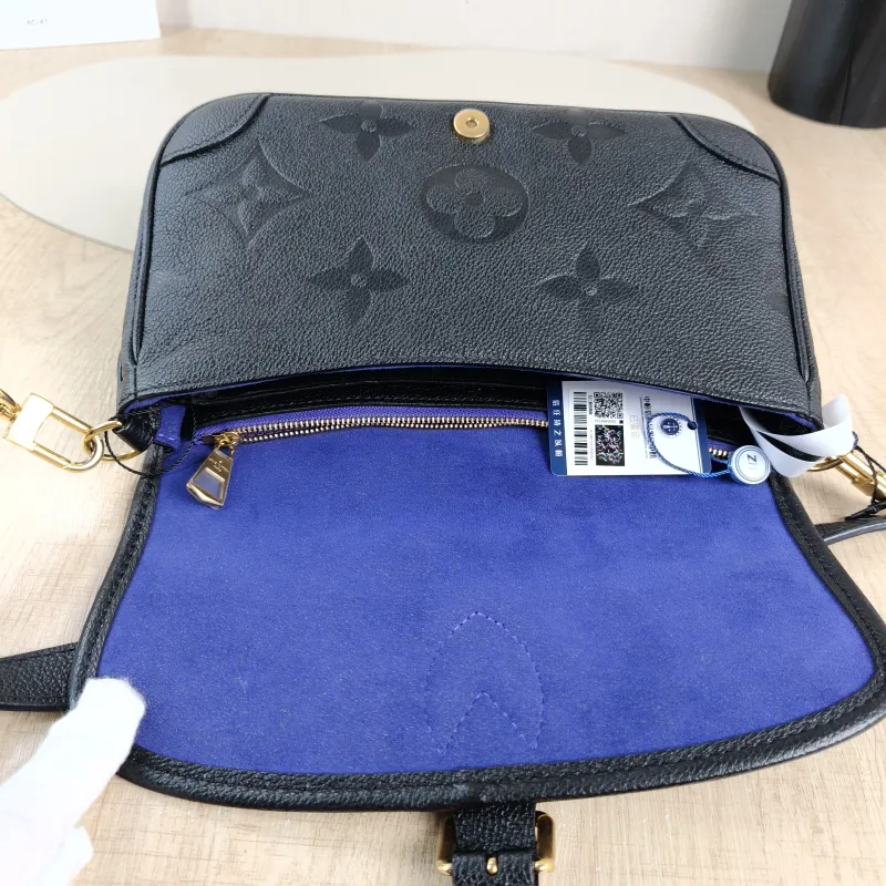 Louis Vuitton Crossbody Bag Diane Baguette Bag Black Empreinte Embossed Calfskin Small24 × 9 × 15 cm — detail view 11 of 14