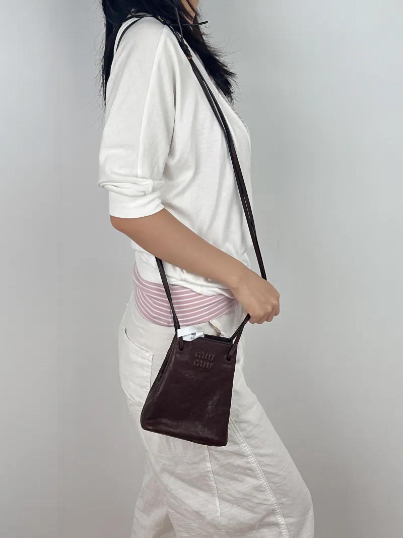 Miumiu Crossbody Bag logo Brown Lambskin One Size 14 × 6 × 16.5 cm — on-model view 1 of 2