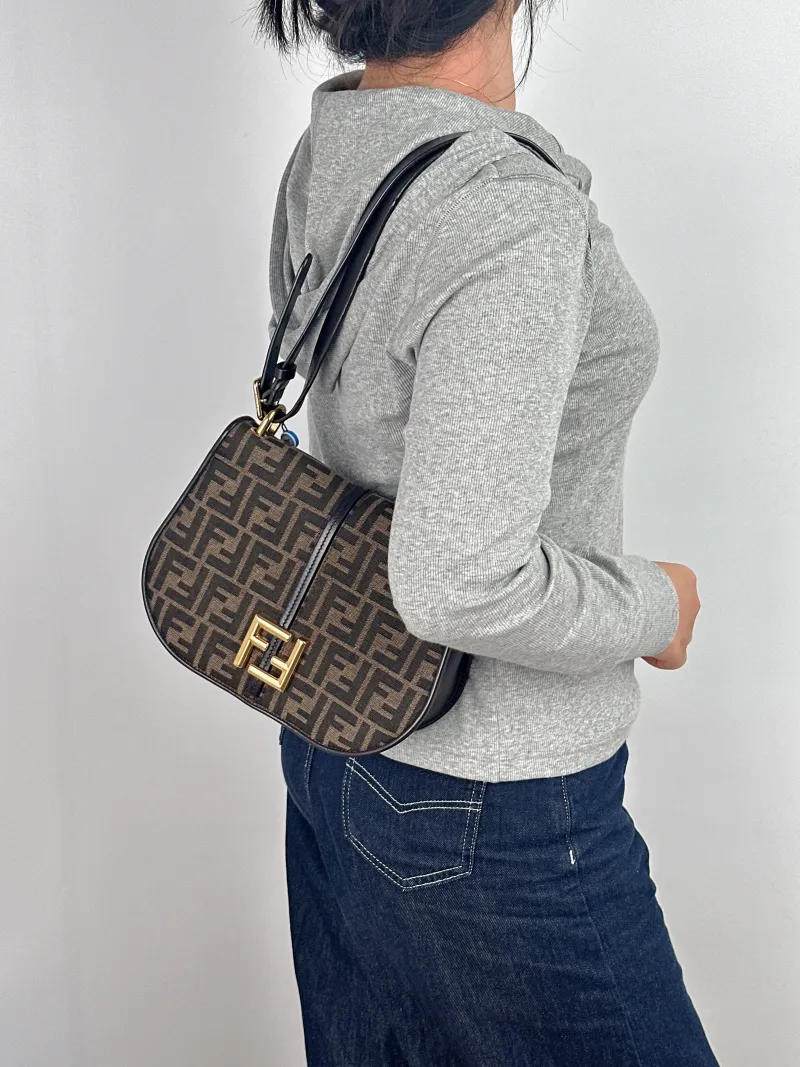 FENDI Crossbody Bag Crossbody Bag Monogram Canvas One Size 25 × 8 × 19 cm — on-model view 1 of 2