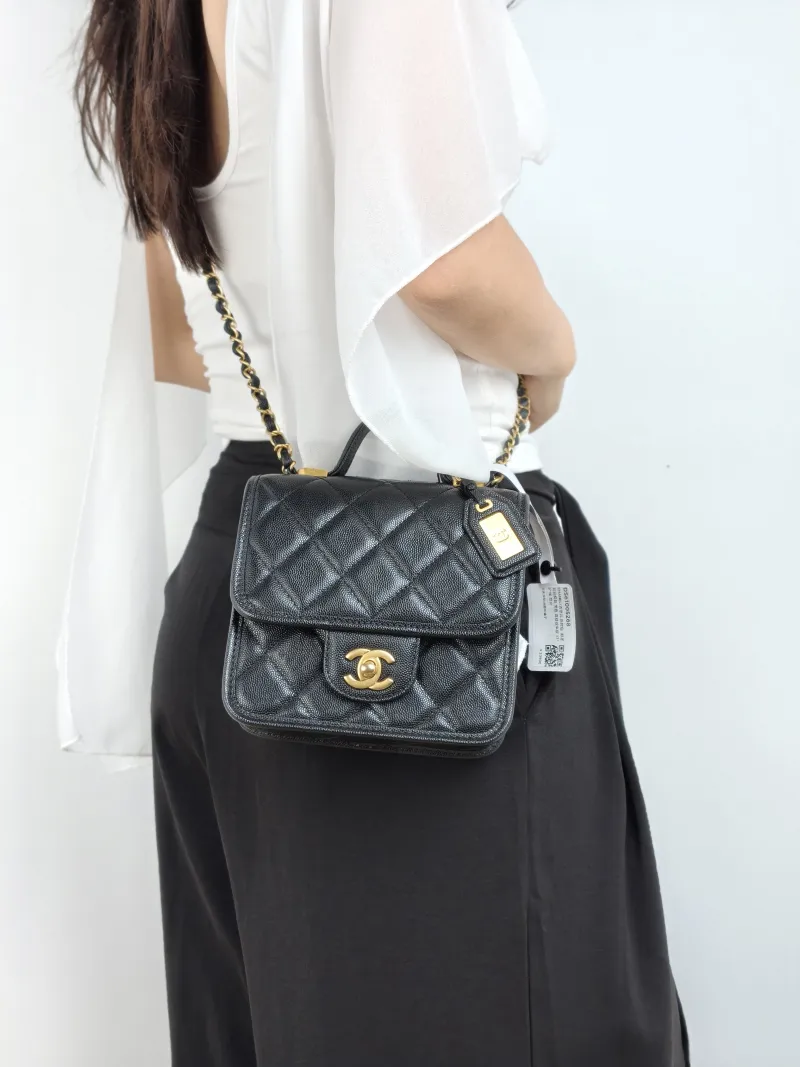Chanel Crossbody Bag Messenger Bag Black Grained Calfskin 17 × 6 × 16 cm — on-model view 1 of 2