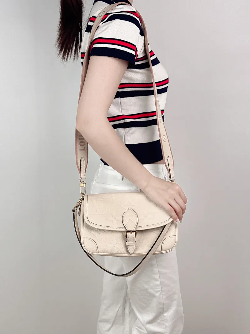 Louis Vuitton Crossbody Bag Diane Baguette Bag White Empreinte Embossed Calfskin Monogram Small24 × 9 × 15 cm — on-model view 2 of 2