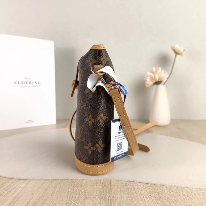 Louis Vuitton Crossbody Bag Fold Me Monogram PVC Mini 14.5 × 6.5 × 18 cm — detail view 4 of 10